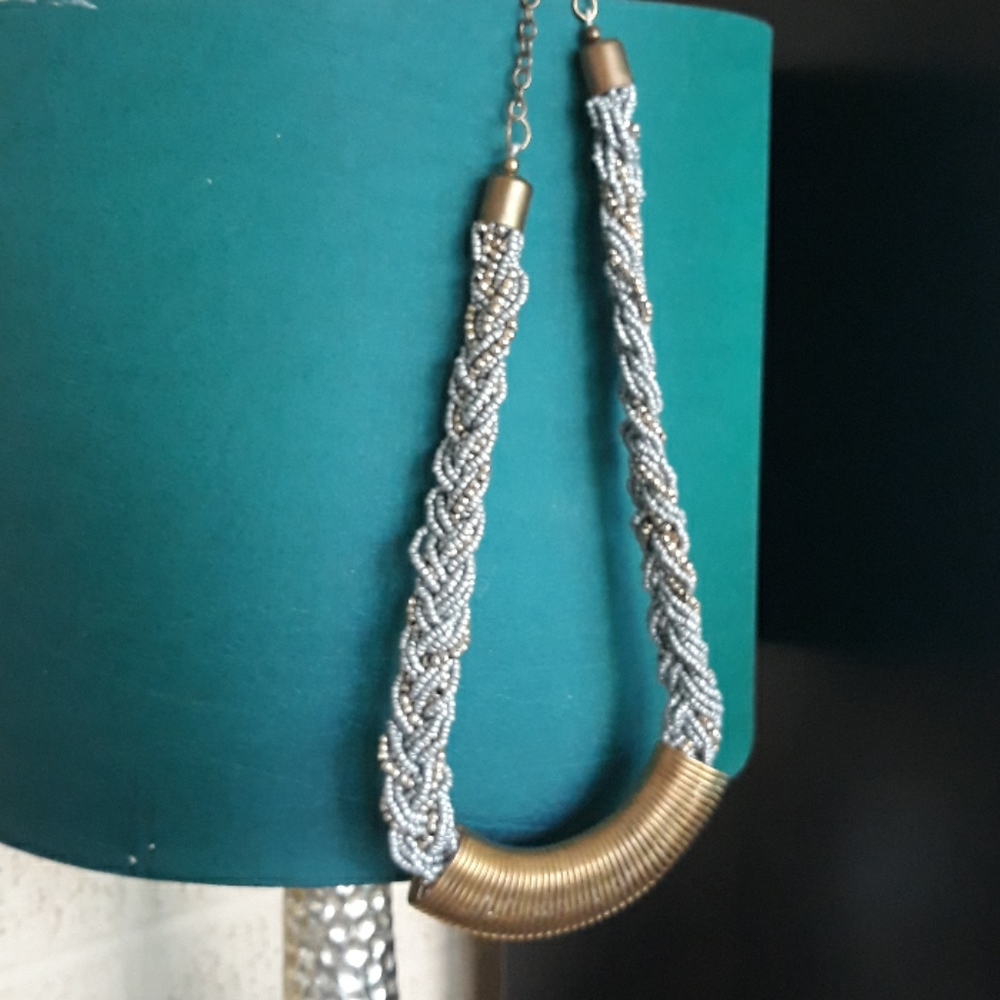 Beaded choker with metal accent piece